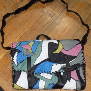 leather laptop bag with green, blue and pink